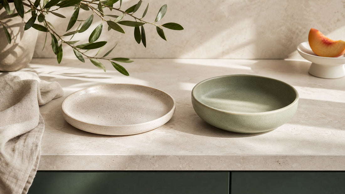 Minimal paired ceramic dishes on a warm kitchen surface for a format comparison.